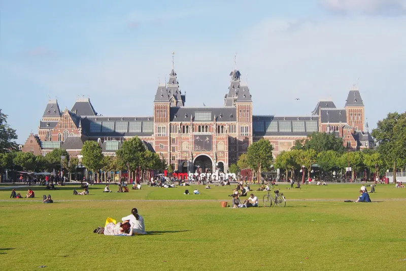 The Rijksmuseum seen across the lawns of Museumplein