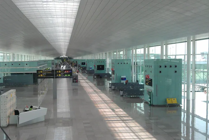 The long glass hall of Barcelona airport's Terminal 1