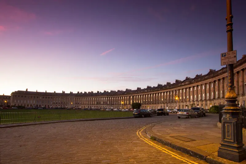 The Royal Crescent curving above its lawn in Bath
