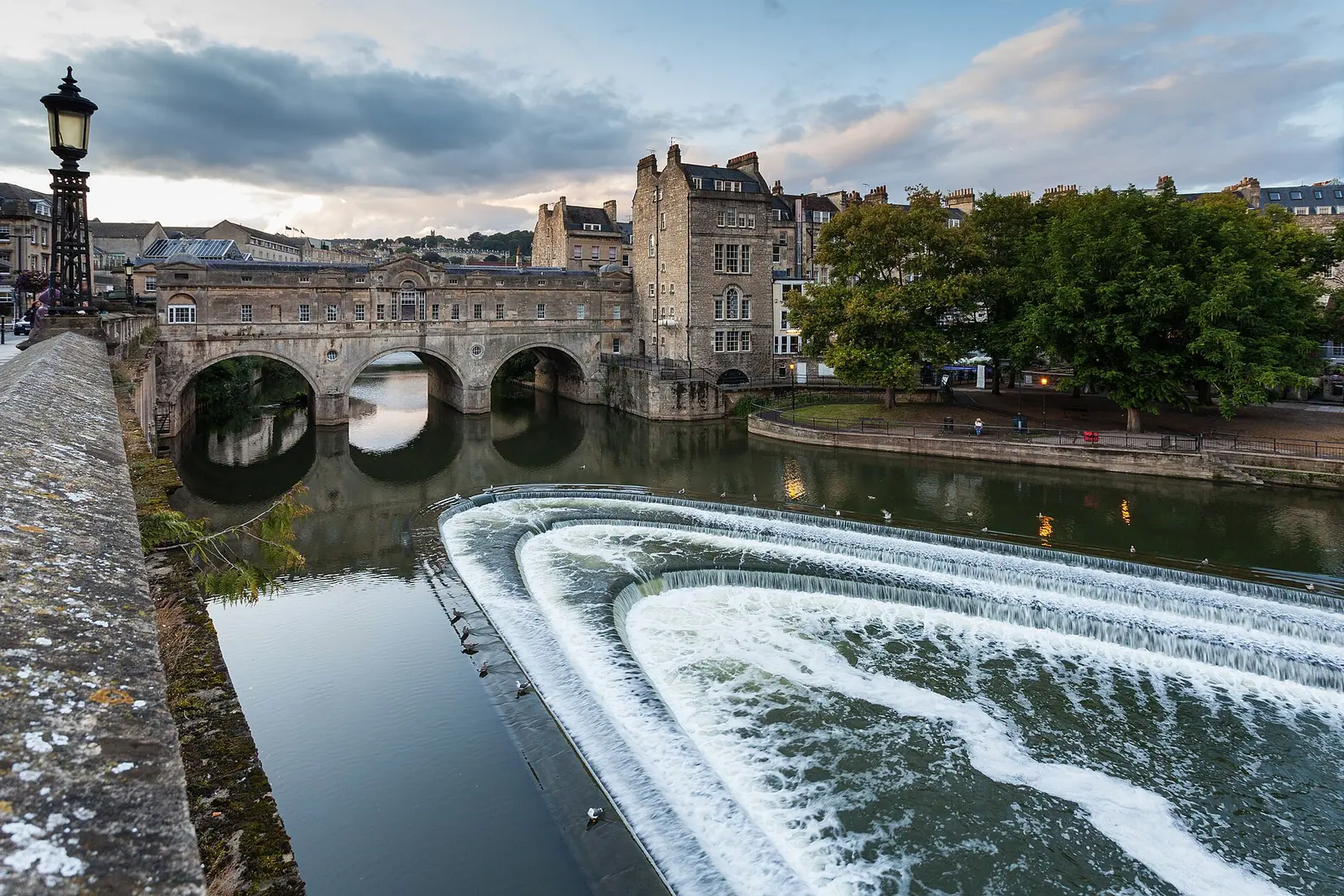 Pulteney Bridge crossing the River Avon above the weir in Bath
