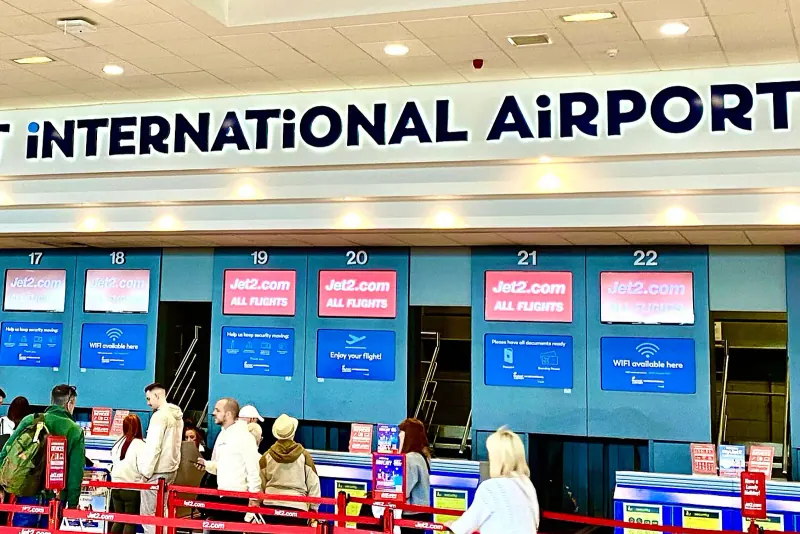 Belfast International Airport terminal entrance and signage