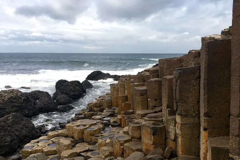 Basalt columns meeting the waves at the Giant's Causeway