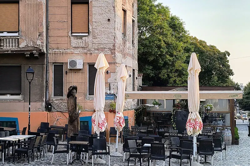 Cafe tables along the cobbles of Skadarlija street
