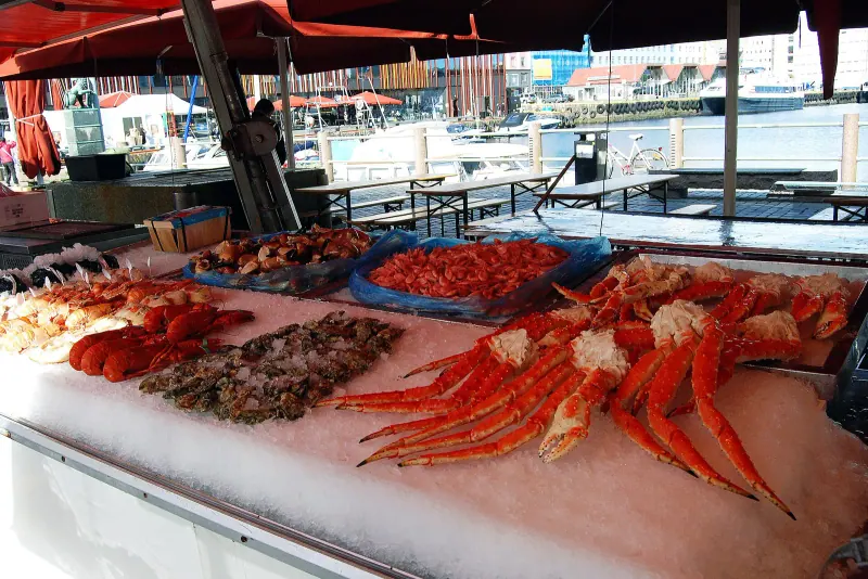 Crab and seafood on ice at a Bergen fish market stall