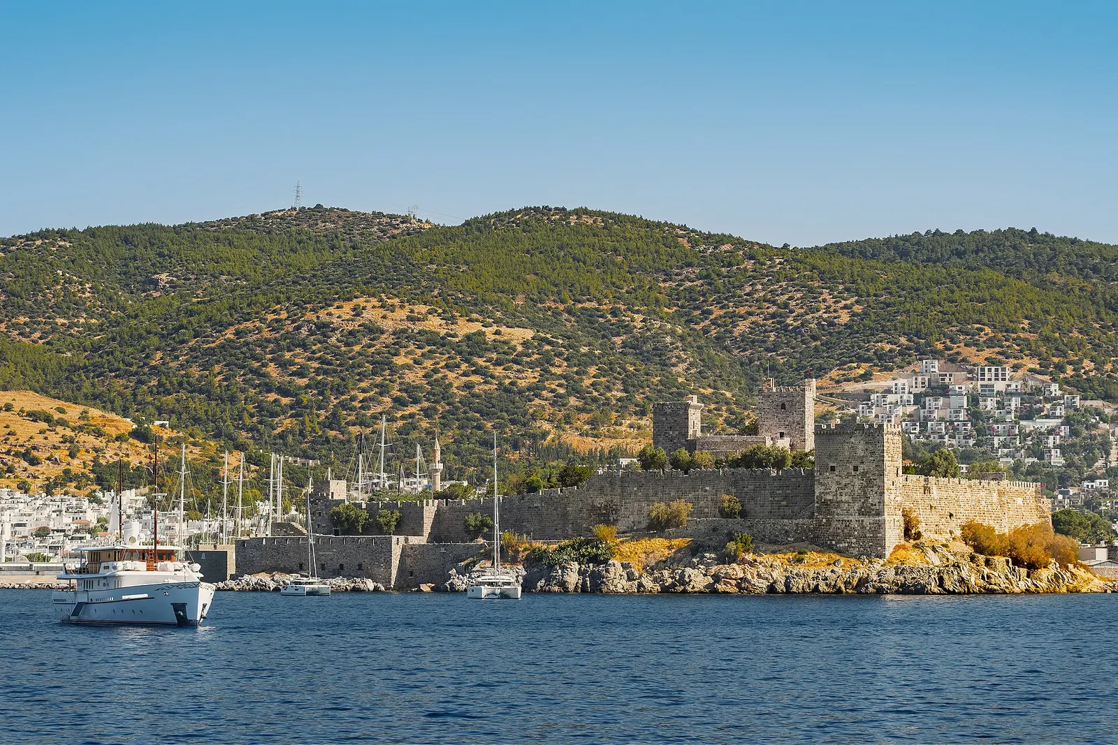 Bodrum Castle on its peninsula with the harbor and hillside town behind