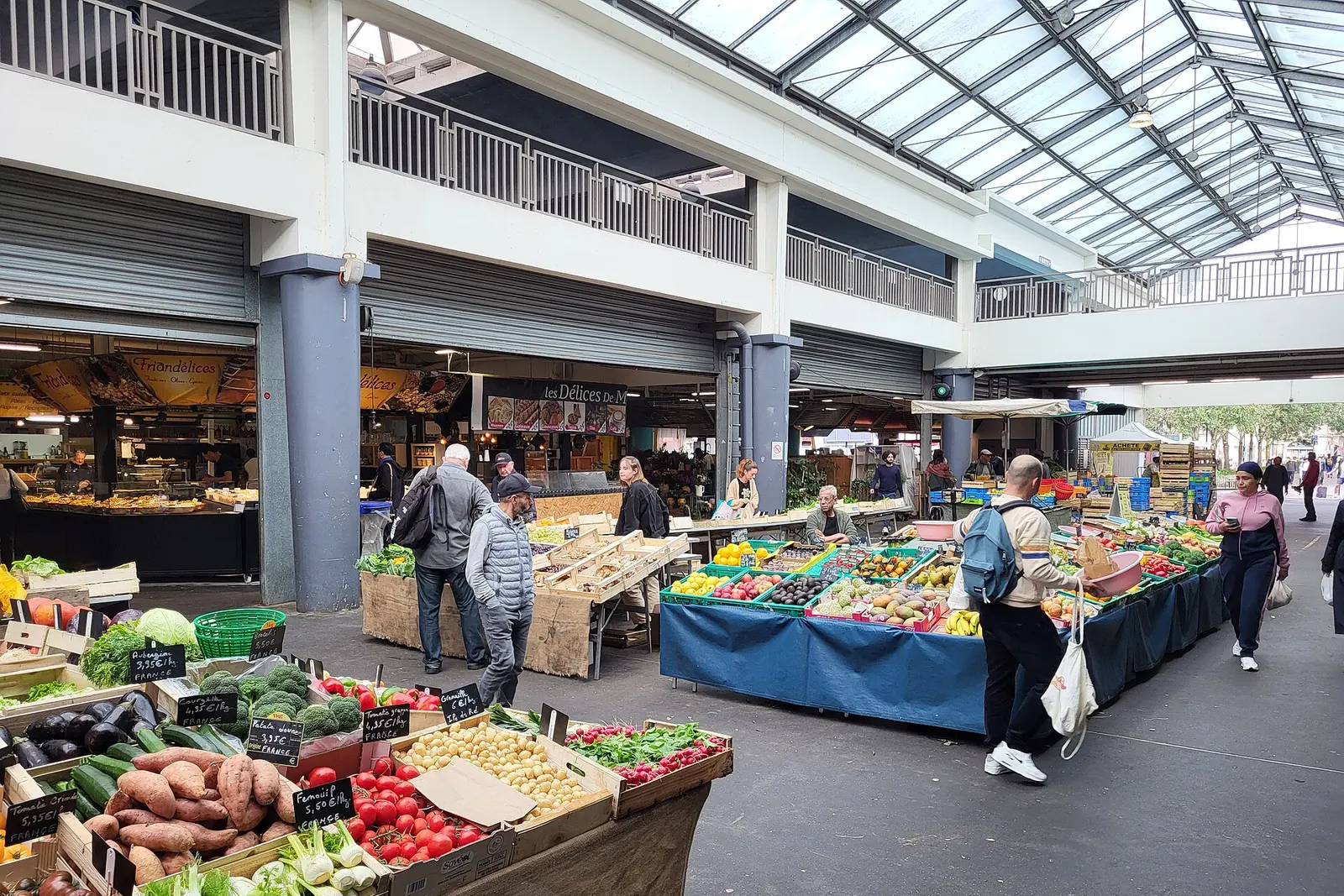 Produce and food stalls inside the Marche des Capucins in Bordeaux