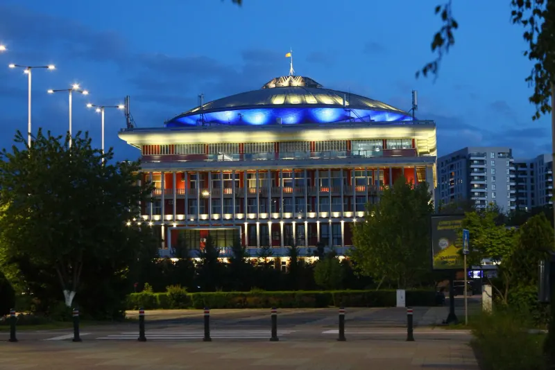 The Romanian Athenaeum lit up at dusk