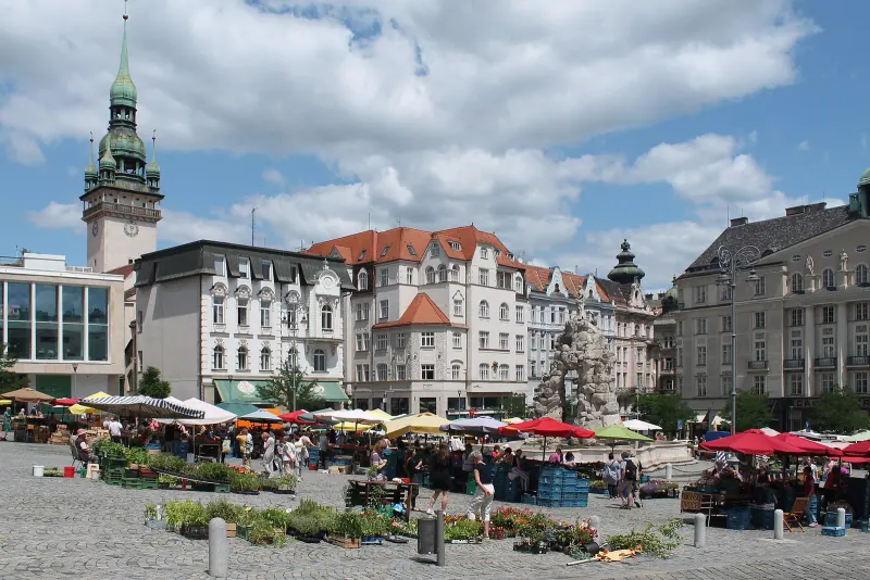 Market stalls on Zelny trh square with the Old Town Hall tower, Brno