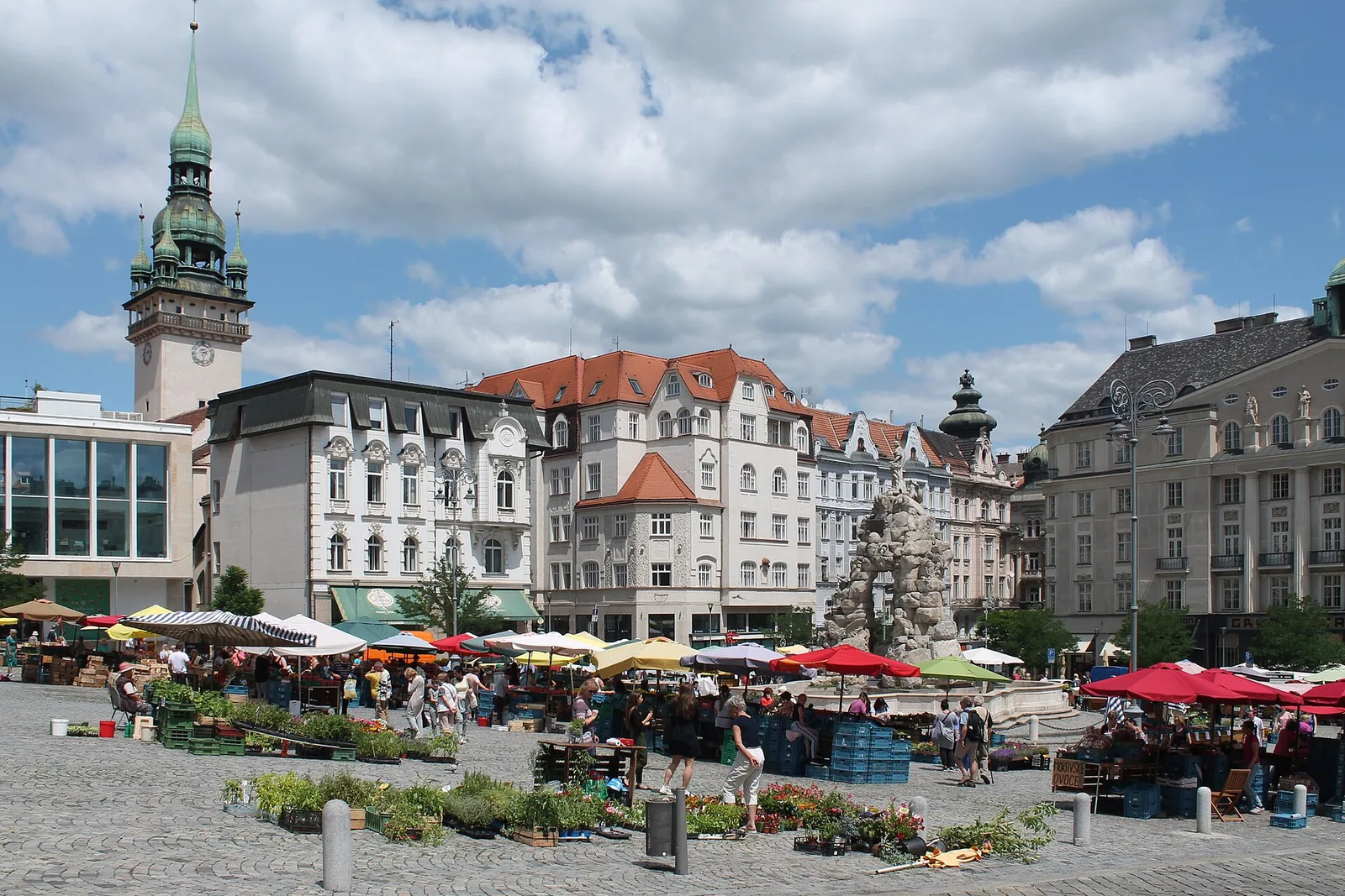 Market stalls on Zelny trh square with the Old Town Hall tower, Brno