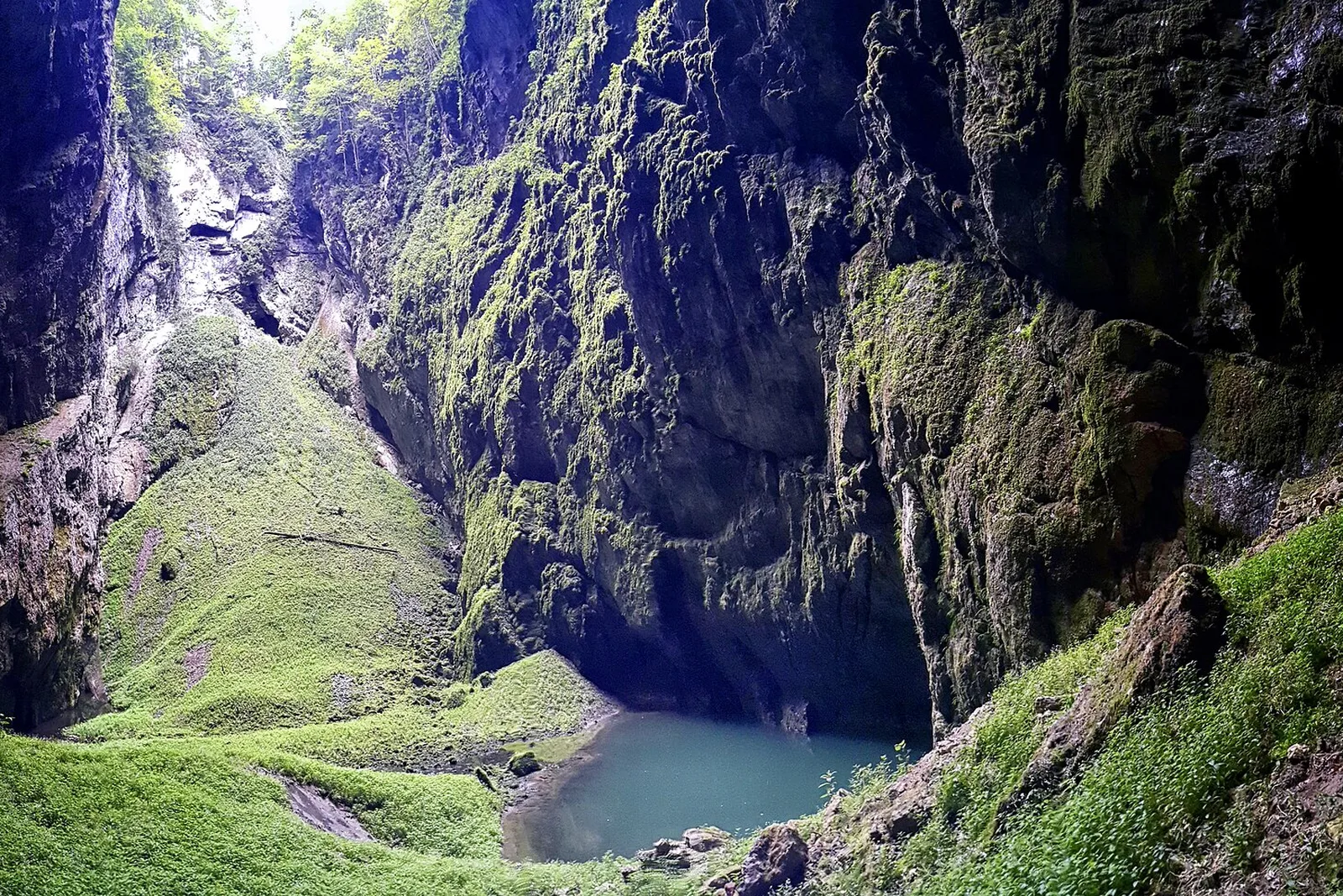 Macocha Abyss sinkhole with its emerald lake in the Moravian Karst