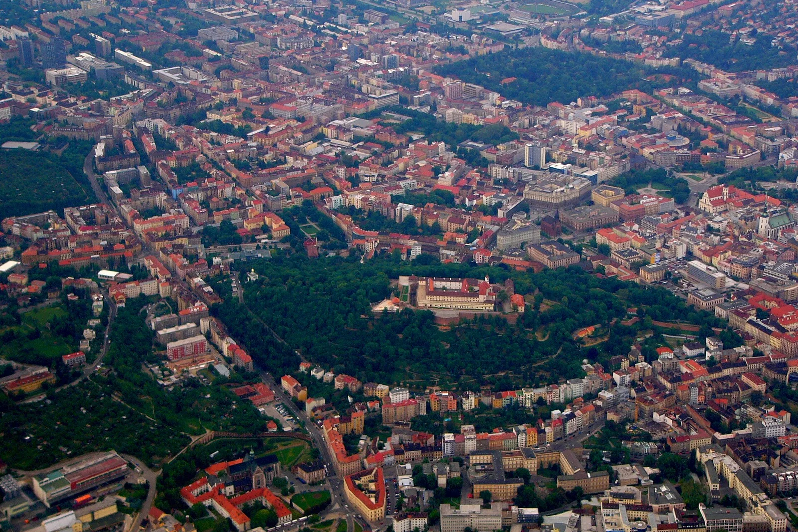 Aerial view of Spilberk Castle on its wooded hill above Brno