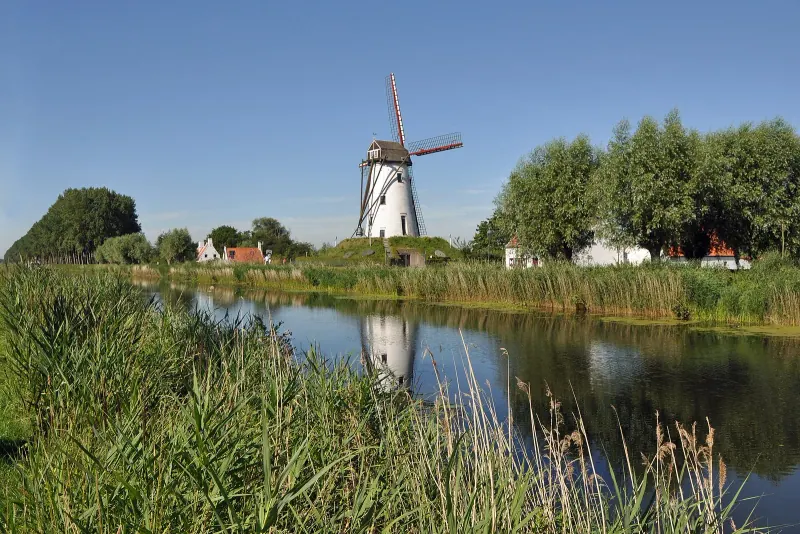 The Schellemolen windmill on the canal outside Damme