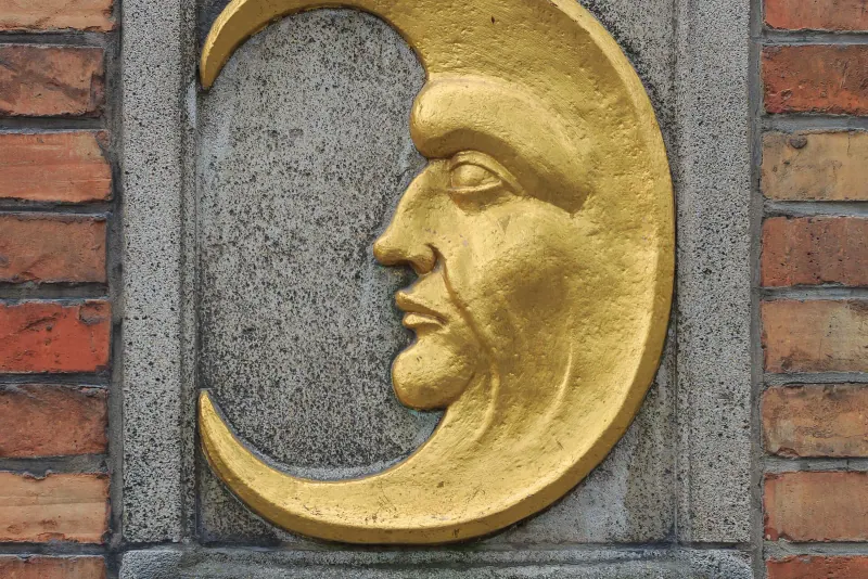 The golden half-moon sign at the De Halve Maan brewery in Bruges