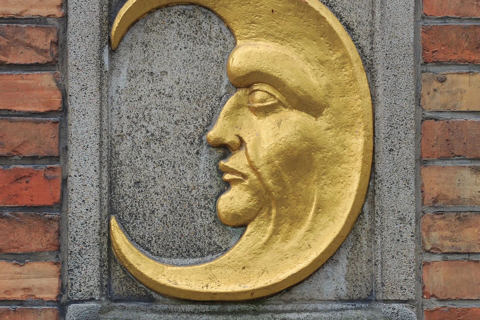 The golden half-moon sign at the De Halve Maan brewery in Bruges