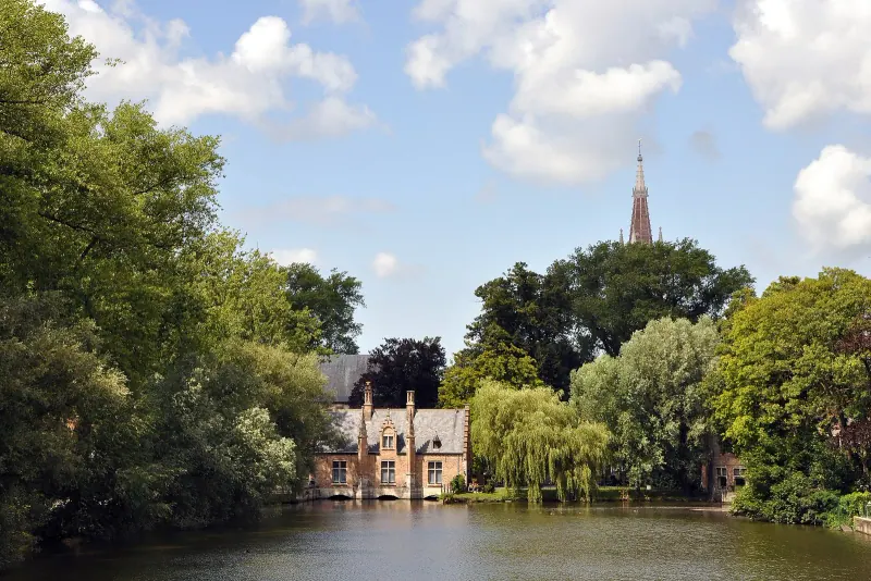 The Minnewater lake and Sashuis in Bruges