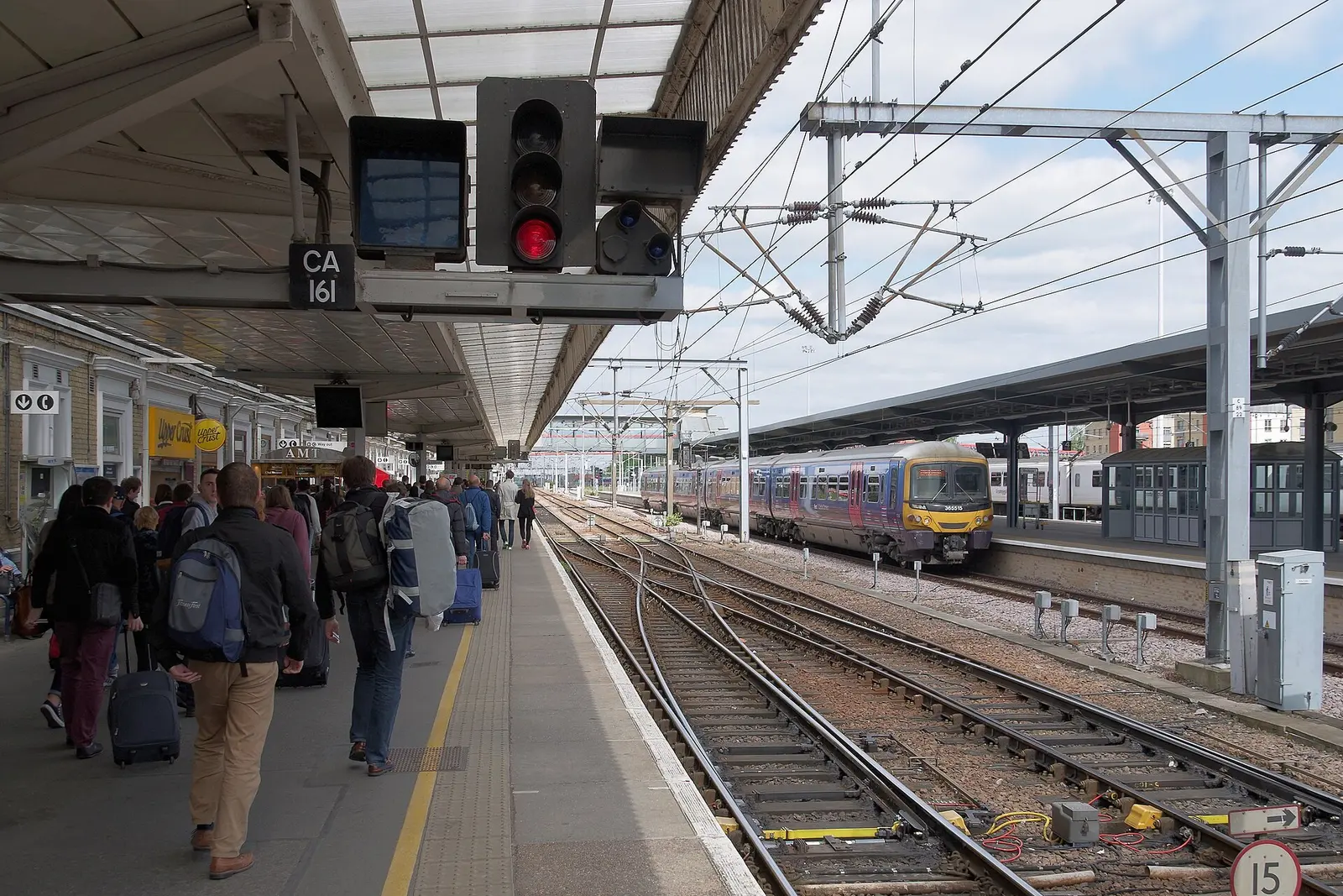 Passengers on the platform at Cambridge station