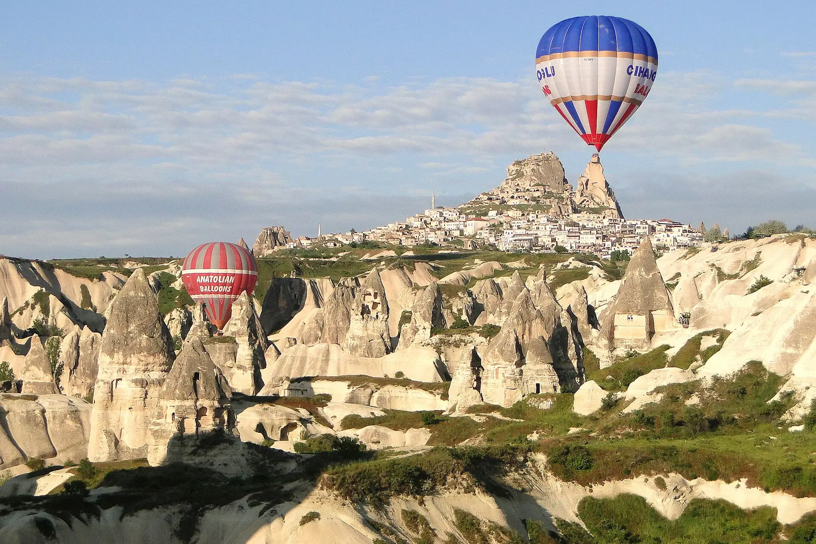 A balloon rising at dawn over Goreme, Cappadocia