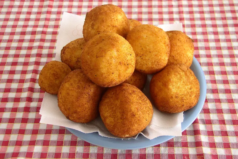 Arancini on a checkered paper