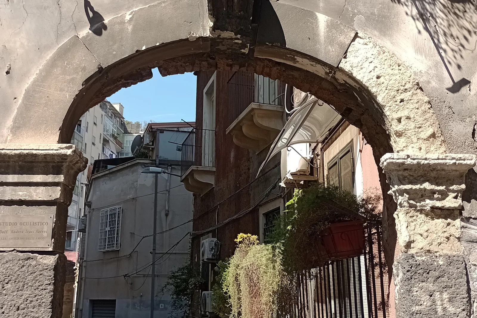 An archway street off Via Etnea in Catania