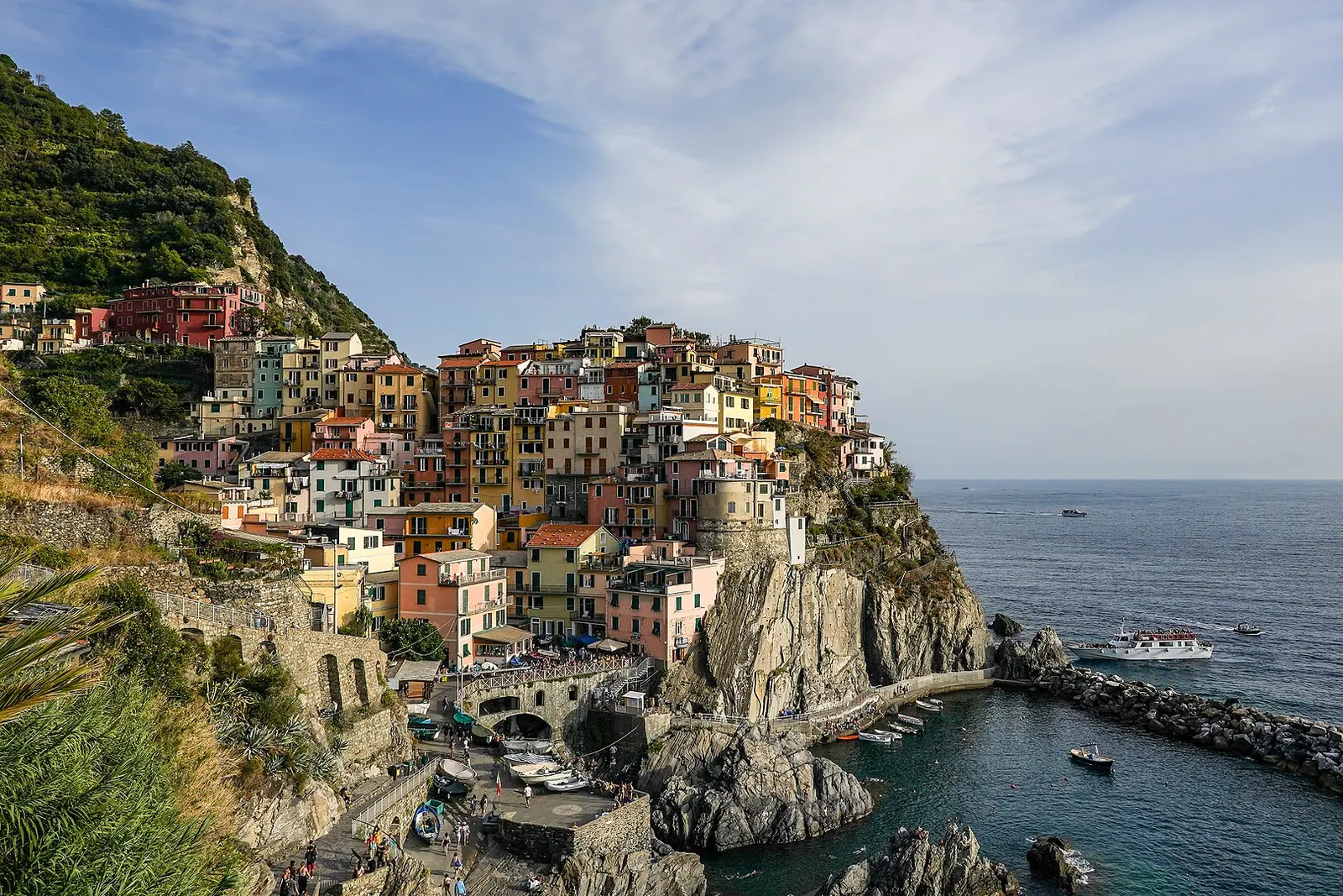 The colorful houses of Manarola stacked on a rock above the sea in the Cinque Terre