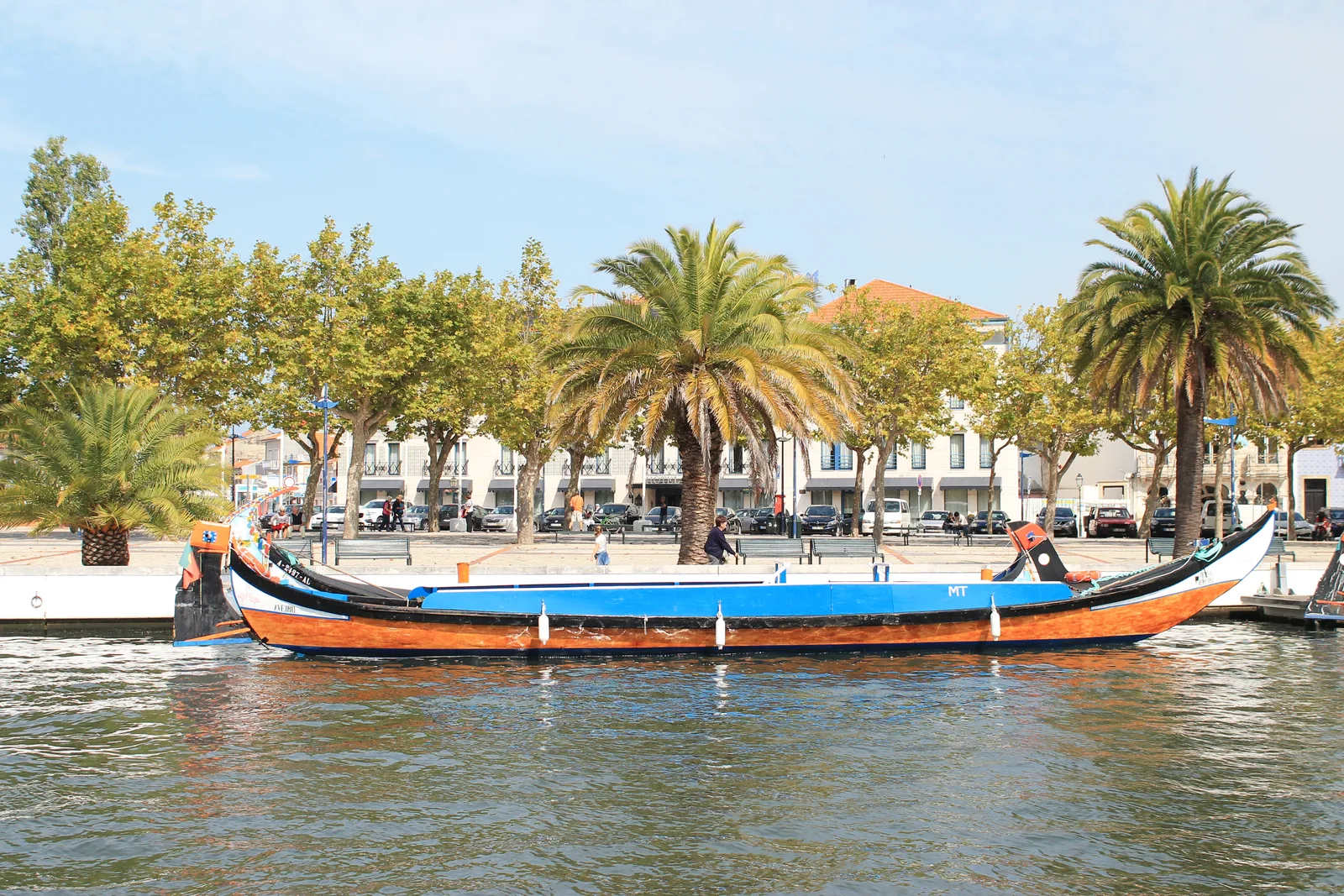Colorful moliceiro boats on a canal in Aveiro