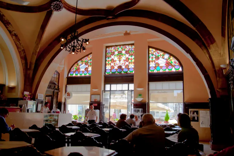 The vaulted interior of Cafe Santa Cruz in Coimbra