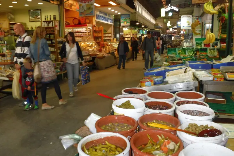 Shoppers inside Chania's covered municipal market