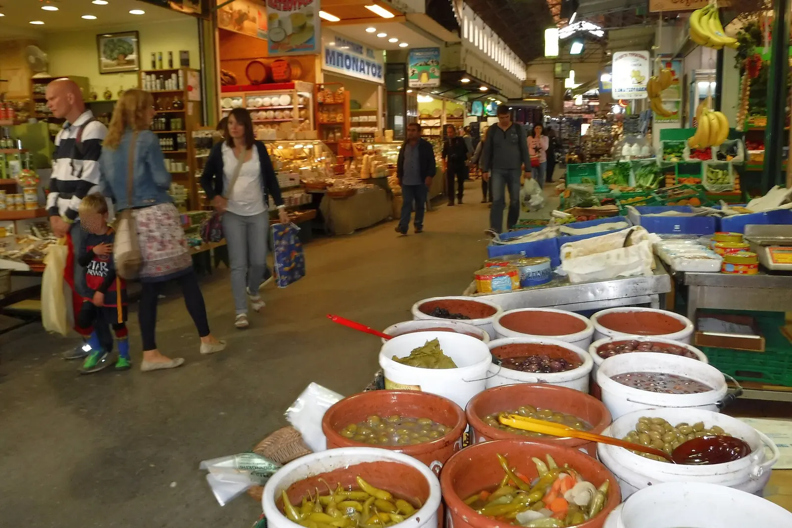 Shoppers inside Chania's covered municipal market