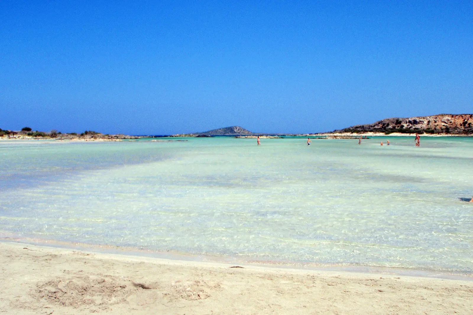 Shallow pink-tinged lagoon at Elafonissi beach, Crete
