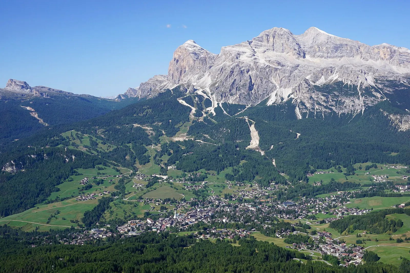 The Cortina d'Ampezzo valley ringed by Dolomite peaks