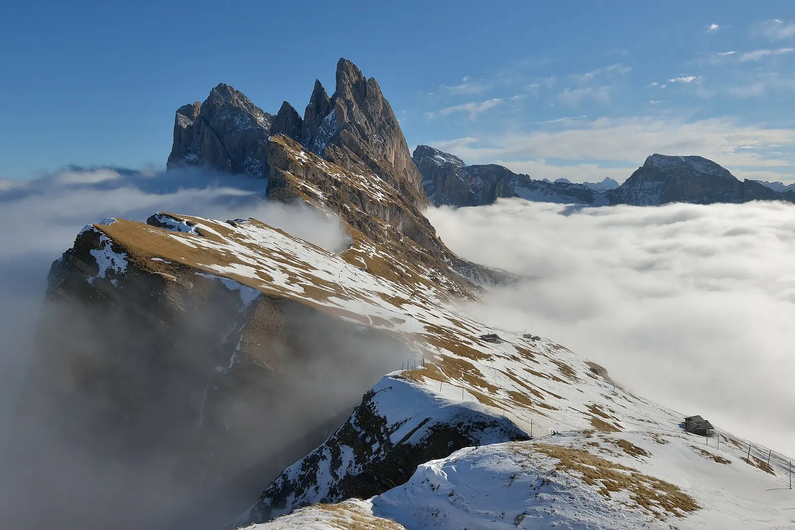 The jagged Seceda ridge rising above a sea of clouds