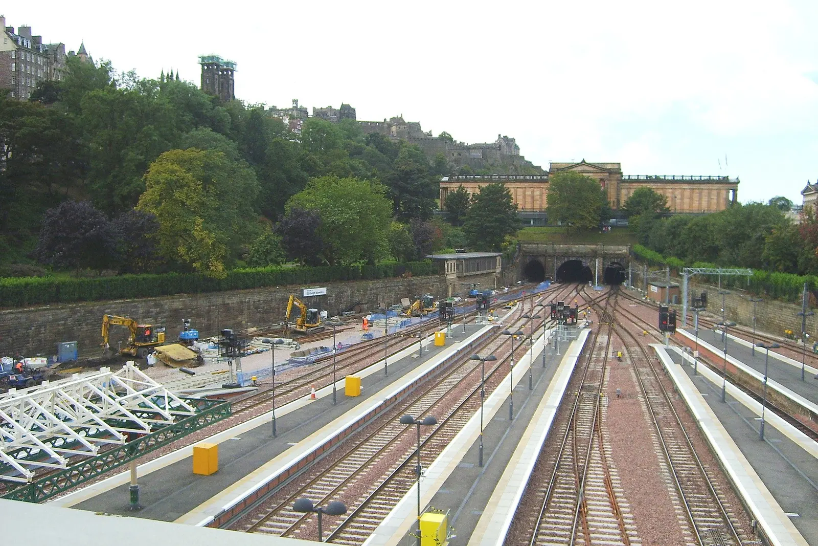 Tracks and platforms at Edinburgh Waverley station below Calton Hill