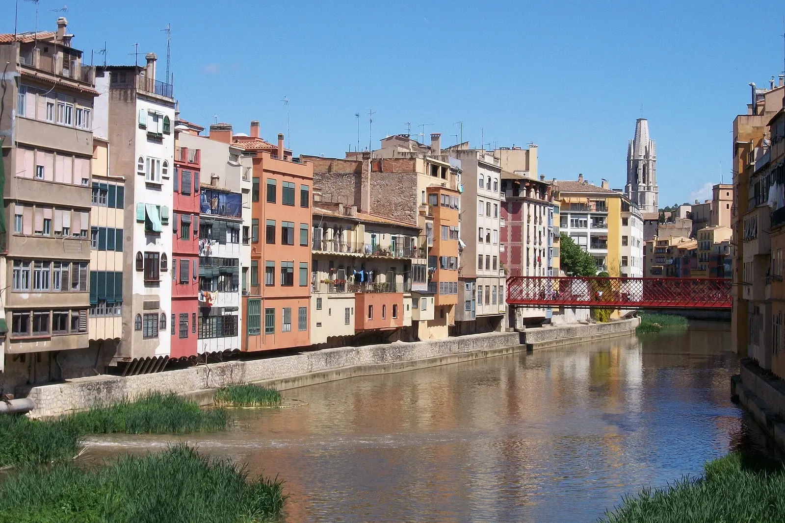 The Eiffel bridge and painted houses over the river Onyar in Girona