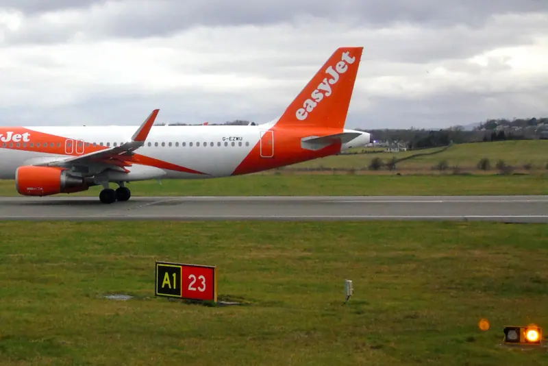 An easyJet aircraft taxiing at Glasgow Airport