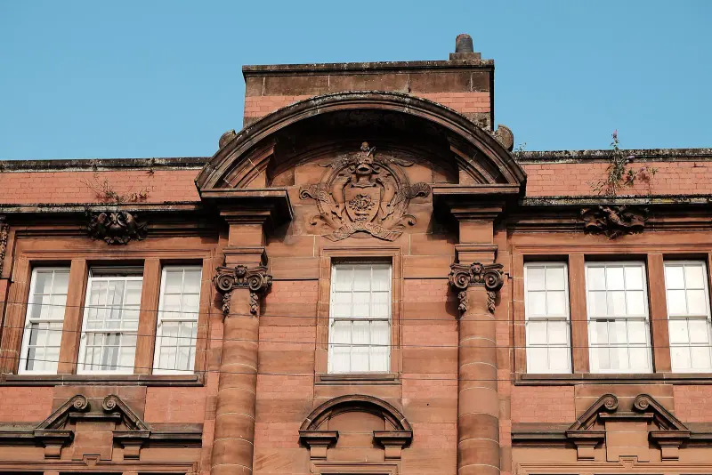 A red sandstone tenement block in Glasgow city centre