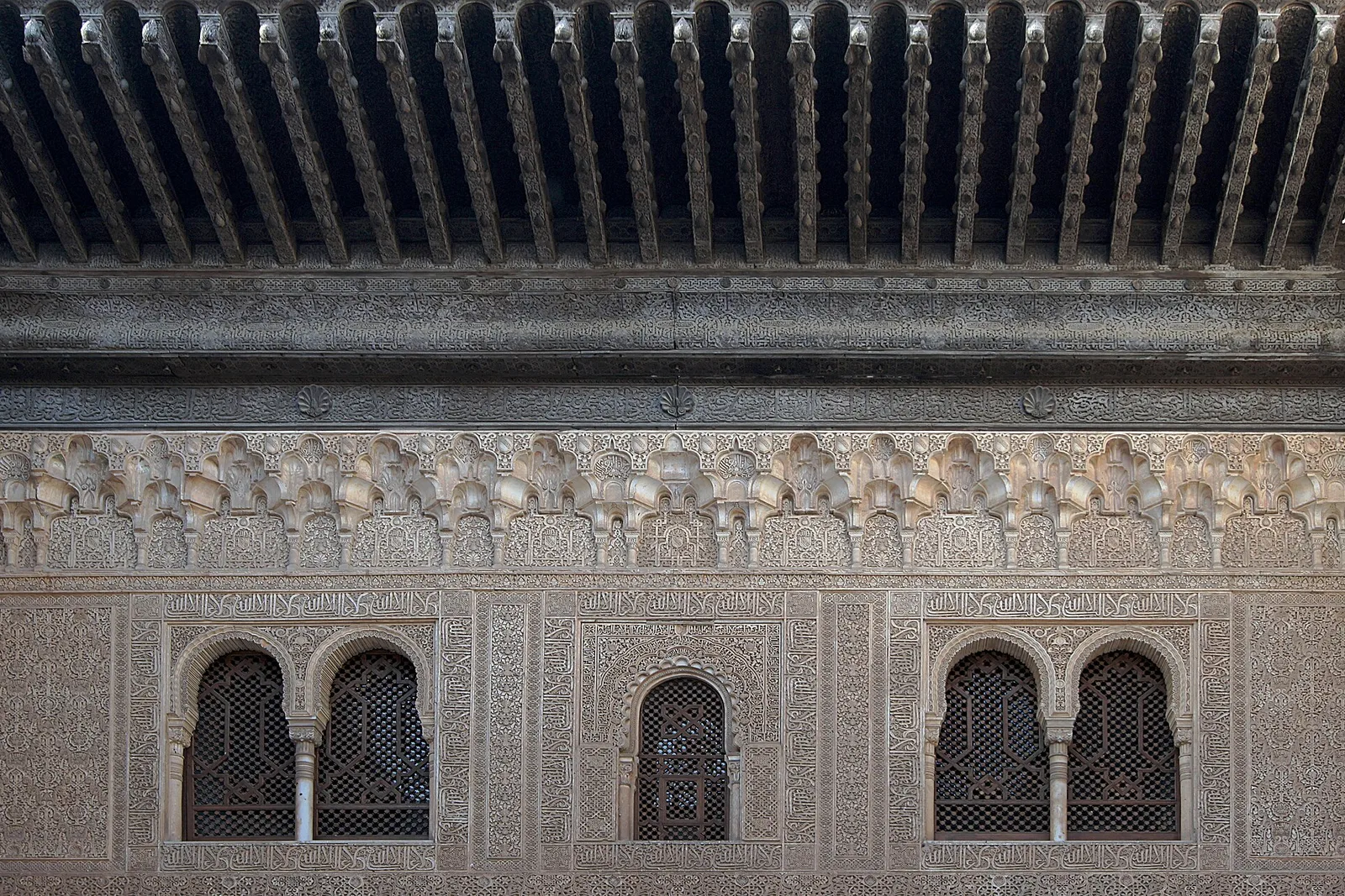 Carved facade inside the Nasrid palaces of the Alhambra