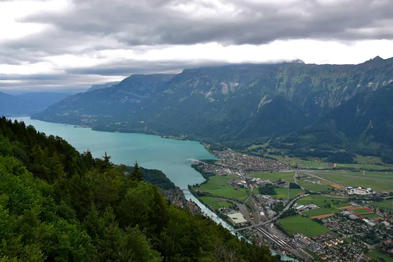 Lake Brienz and the town of Interlaken seen from Harder Kulm with mountains behind