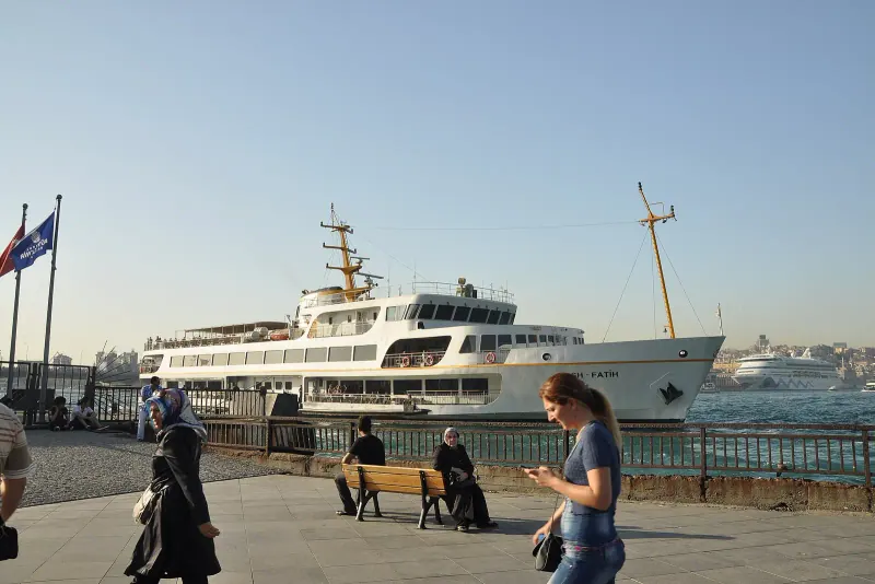 Bosphorus shoreline at Eminonu with ferries and mosque minarets, Istanbul