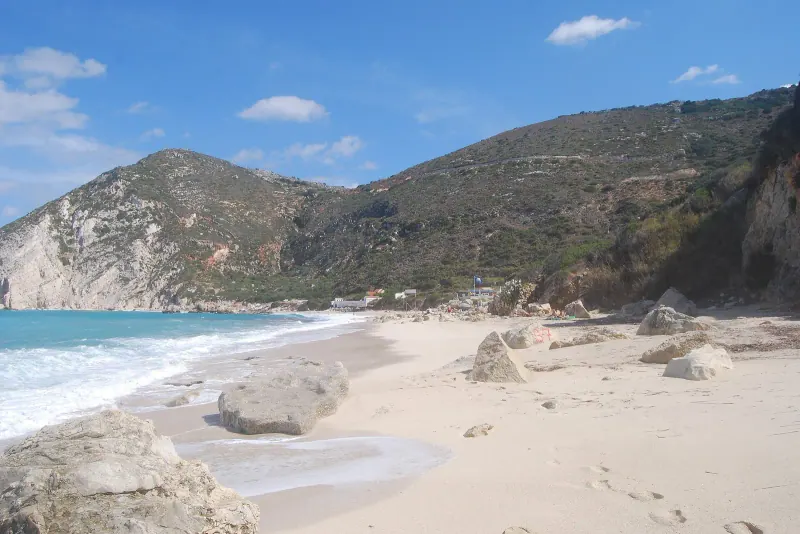 The pale pebble sweep of Petani Beach on Kefalonia's west coast