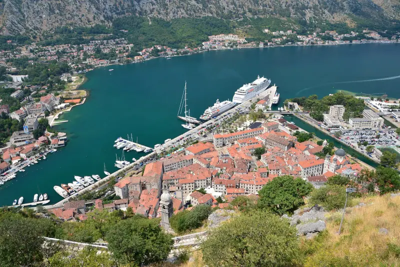Kotor old town beneath its mountain walls
