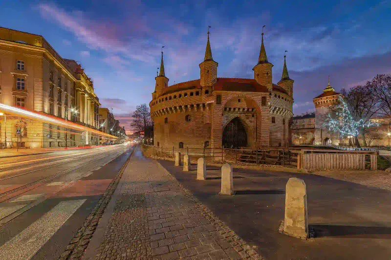 The Krakow Barbican gate at dusk