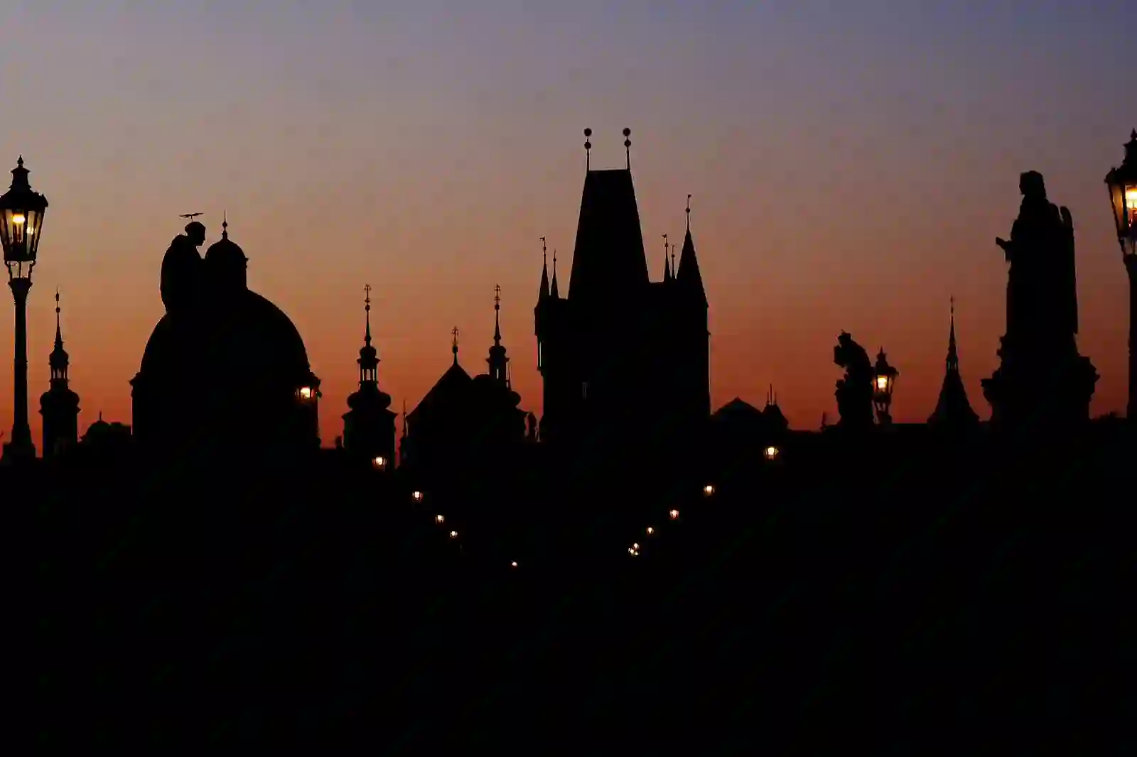 The Prague skyline silhouette at dusk