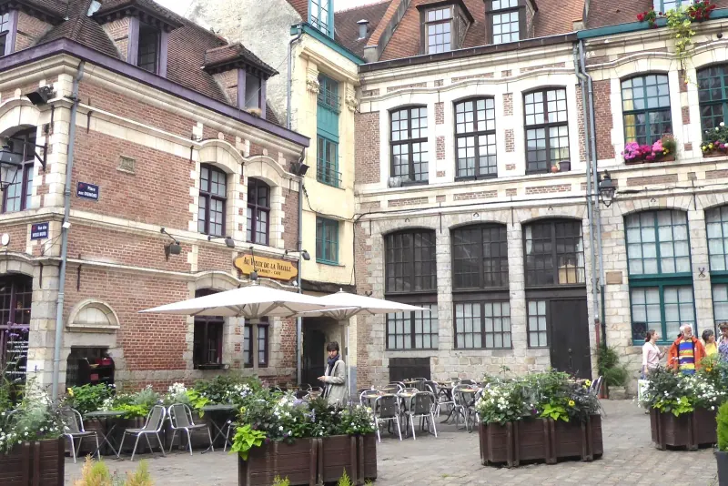 Cafe terraces on the Place aux Oignons square in old Lille