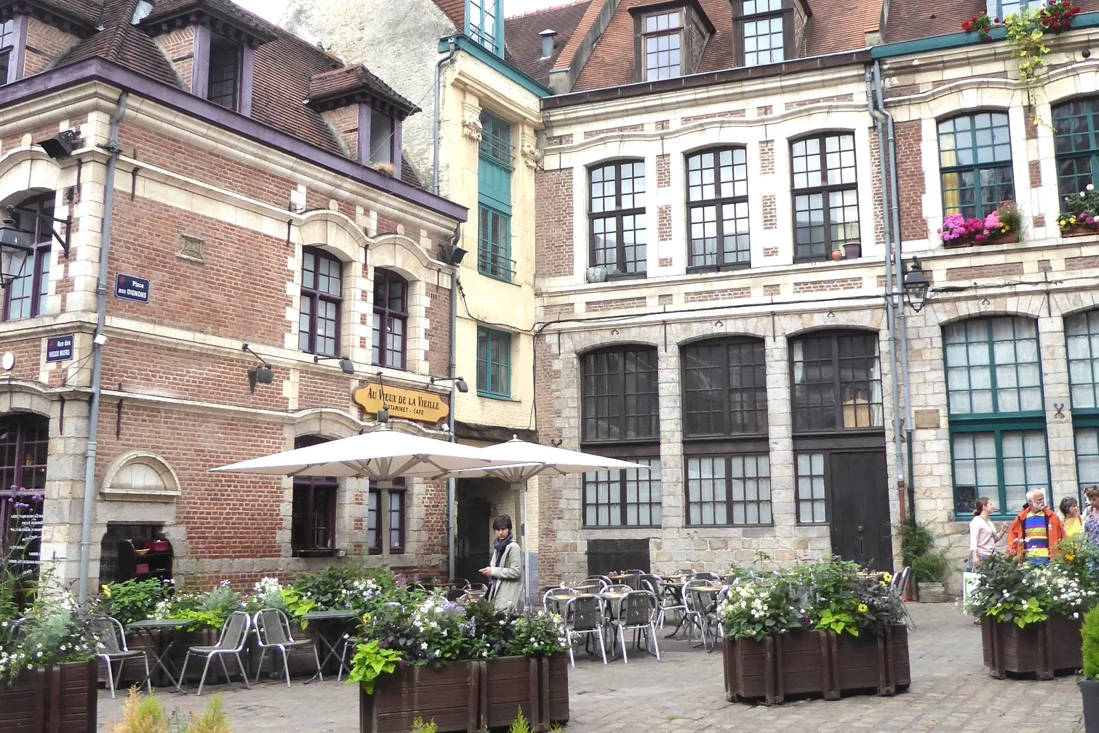 Cafe terraces on the Place aux Oignons square in old Lille