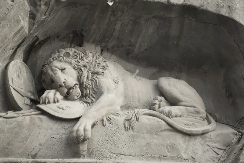 The dying lion carved into the rock at Lucerne's Lion Monument