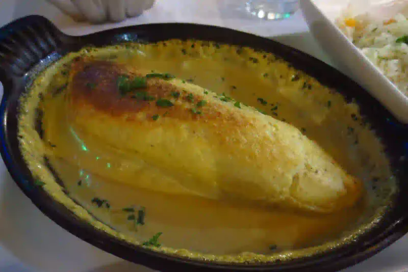 A quenelle de brochet, the classic Lyonnais dish
