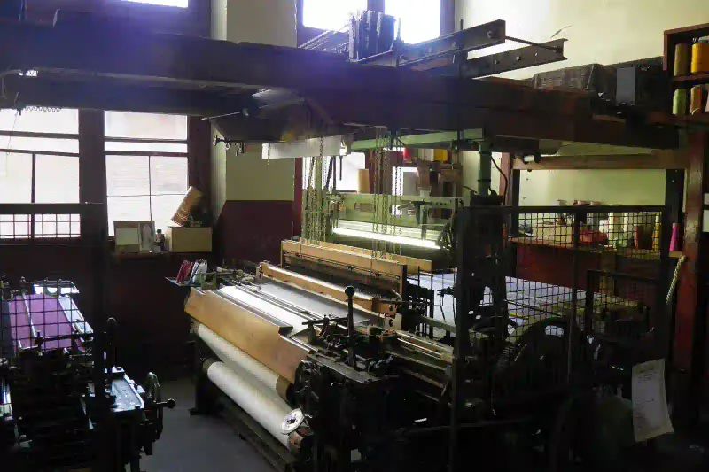 A Jacquard loom at a Lyon silk workshop
