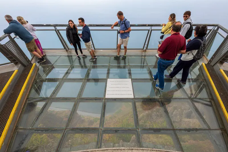 Visitors on the glass platform of the Cabo Girao skywalk