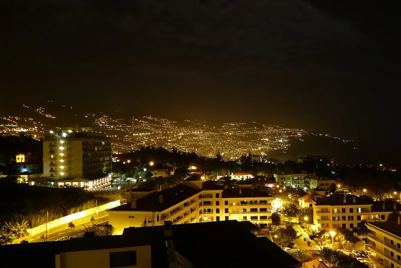 Funchal lit up at night from the hills