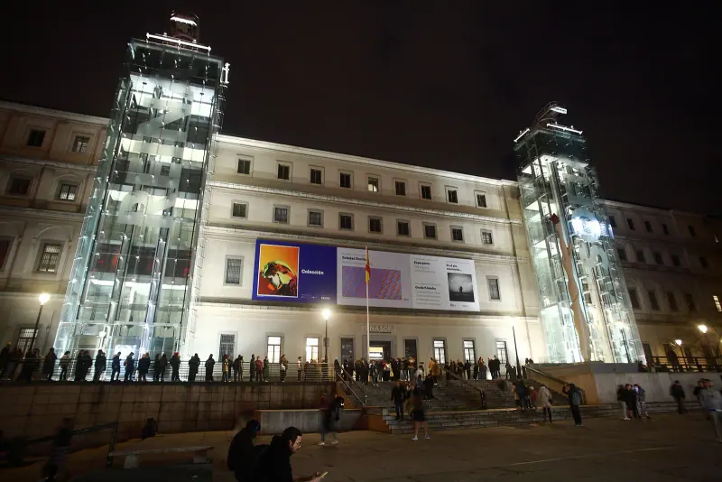 The Reina Sofia museum lit up at night